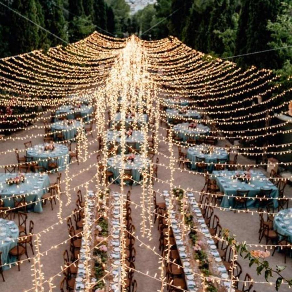 Beautiful fairy light marquee above tables