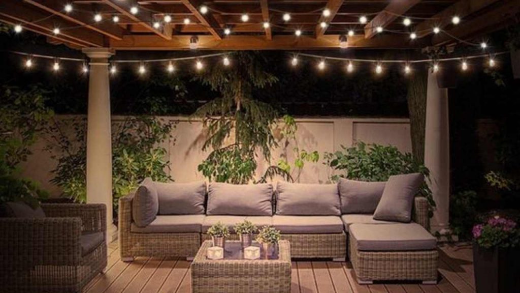 beautiful outdoor lounge with string lights